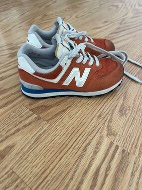 New Balance Kids Orange and White Lace-Up Sneakers with Blue Accent